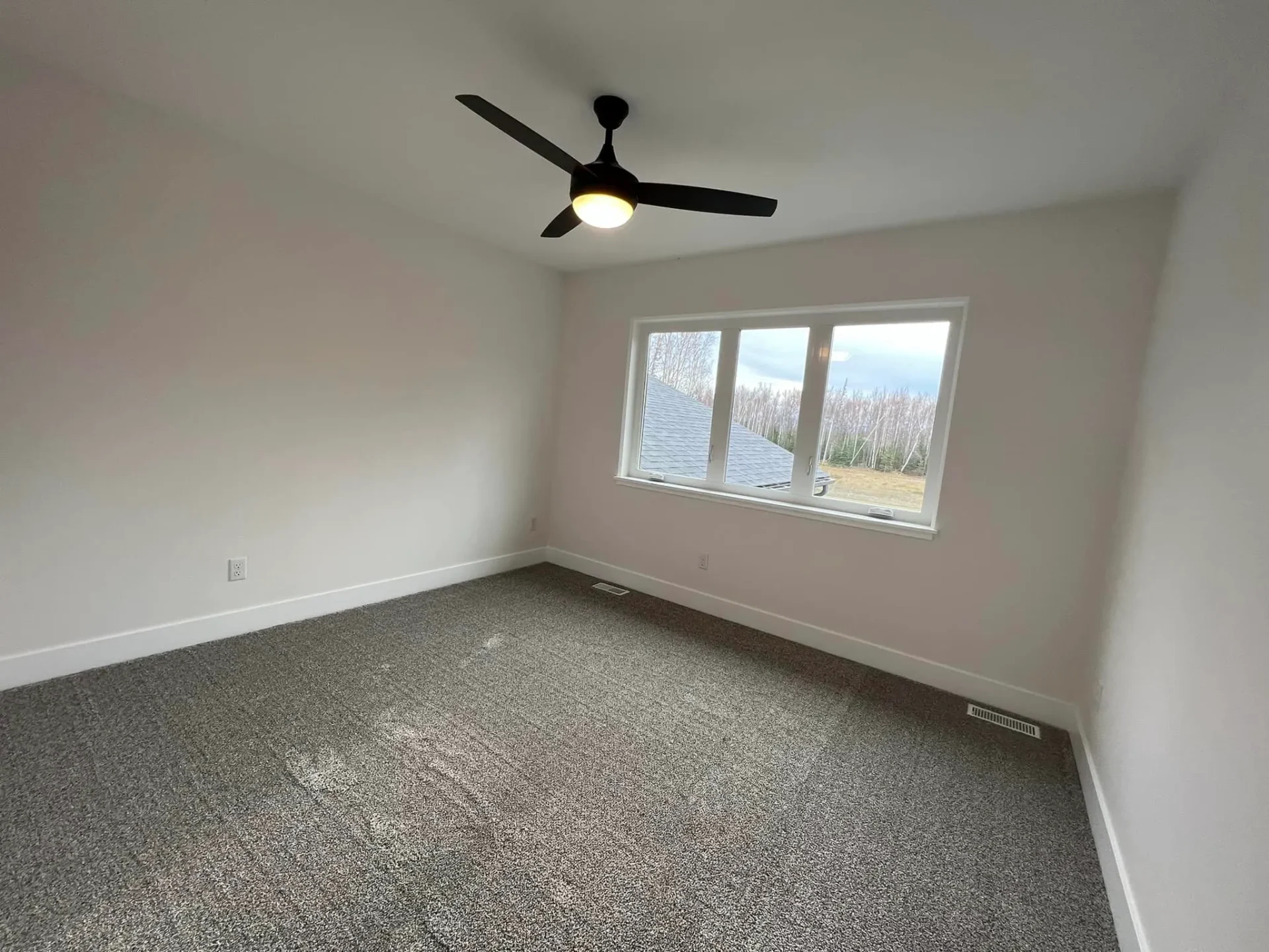 guest bedroom ceiling fan carpet hangar home in alaska