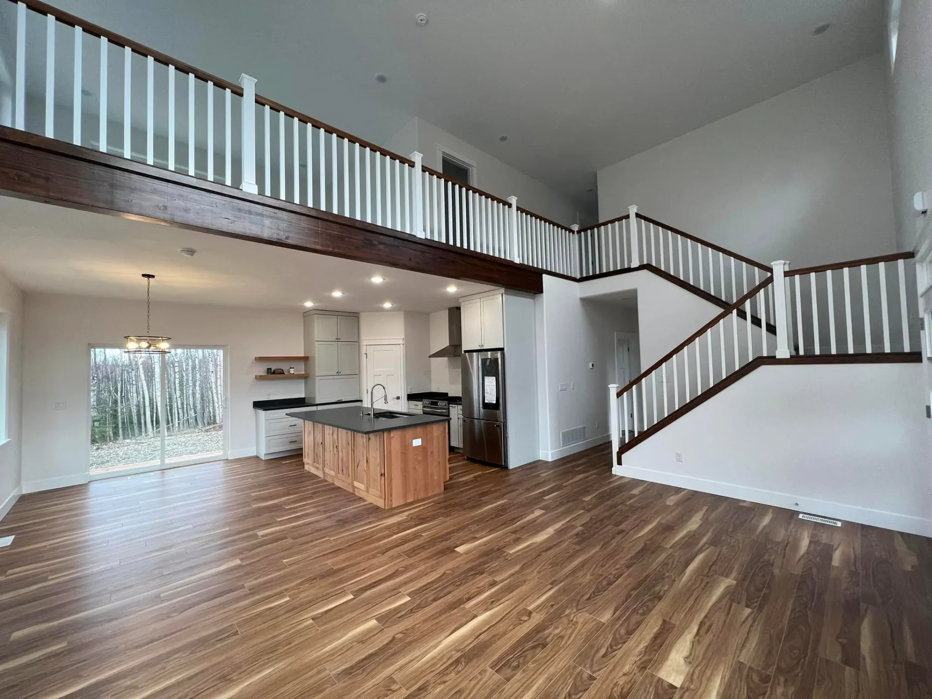 interior staircase balcony hangar home in alaska